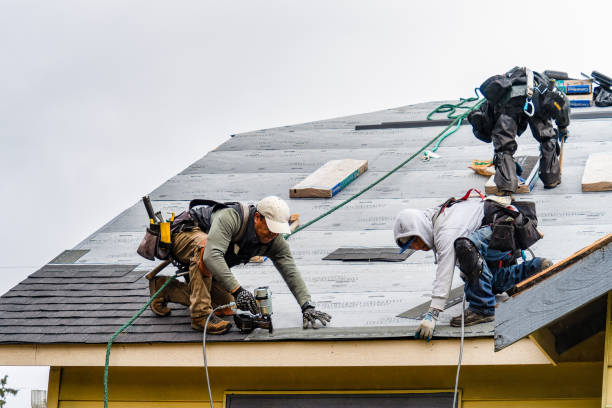Professional Gutter Installation technician working in Southwick, MA
